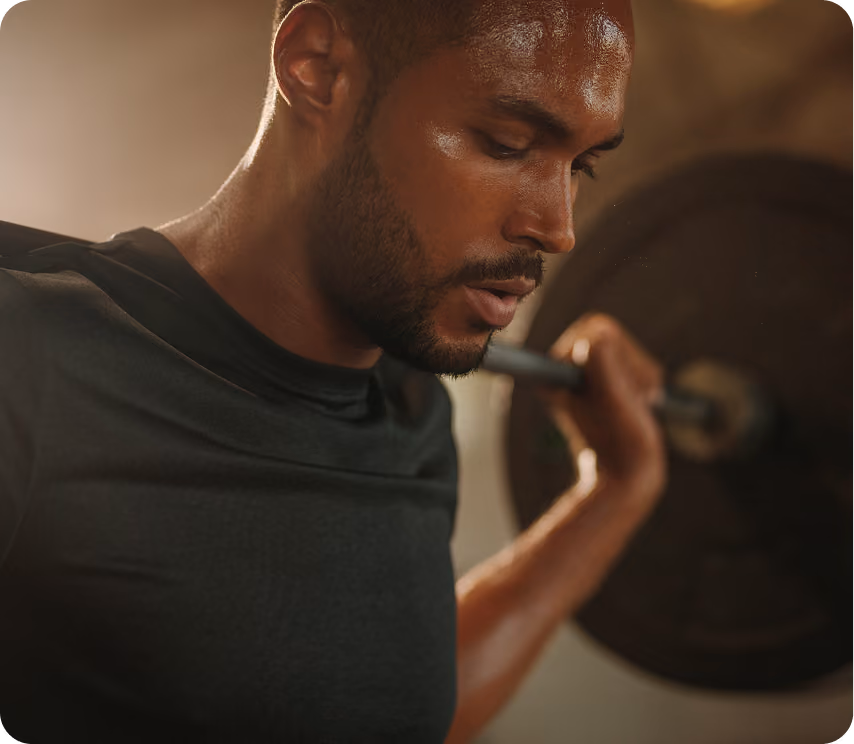 Smiling man in gray shirt with checklist showing personalized health plan benefits like tailored diet advice.