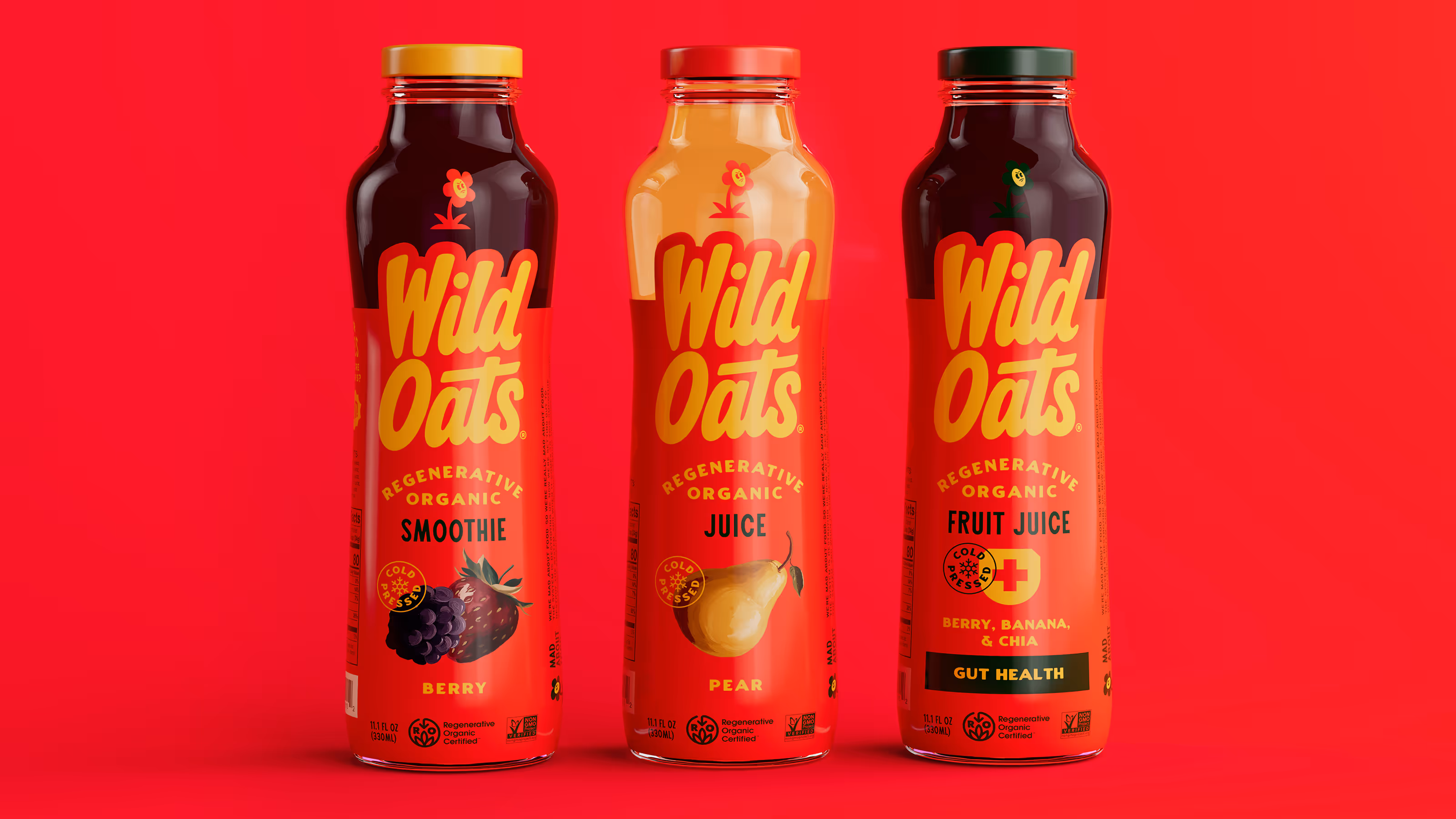 Three Wild Oats regenerative organic juice bottles: Fruit Juice with berry, banana & chia, Pear Juice, and Berry Smoothie.