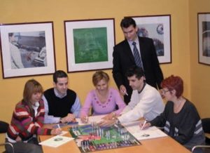 Managers playing a business simulation game.