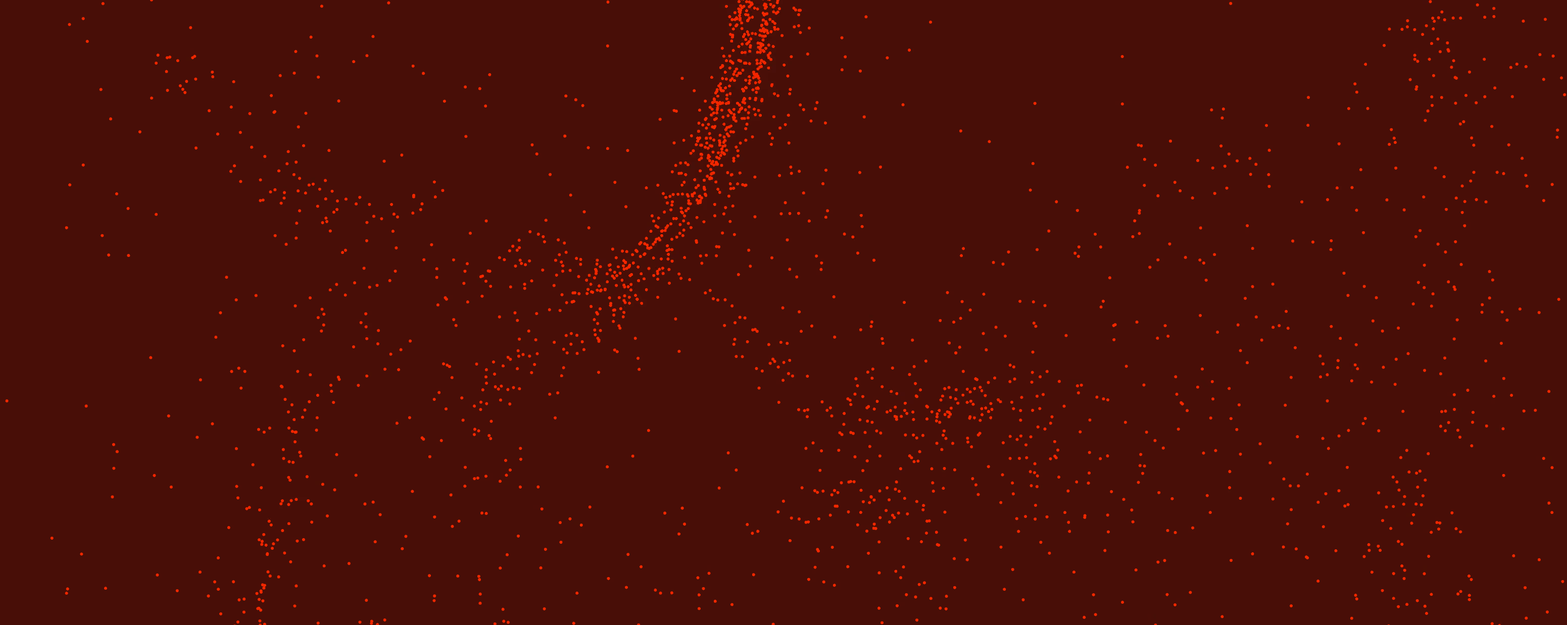 Dark red background with scattered small bright red dots forming abstract patterns.