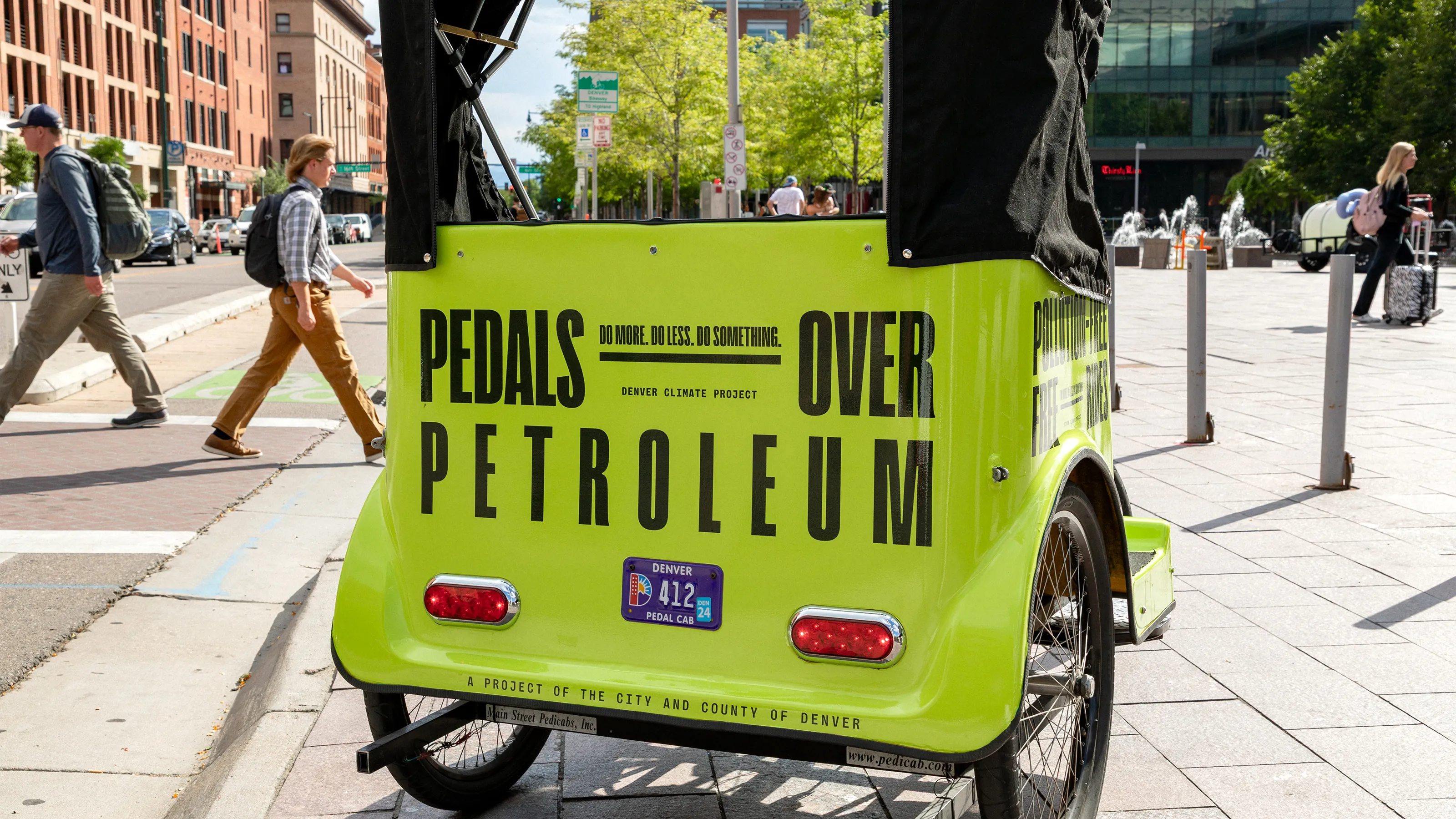 Bright green campaign branded pedi-cab