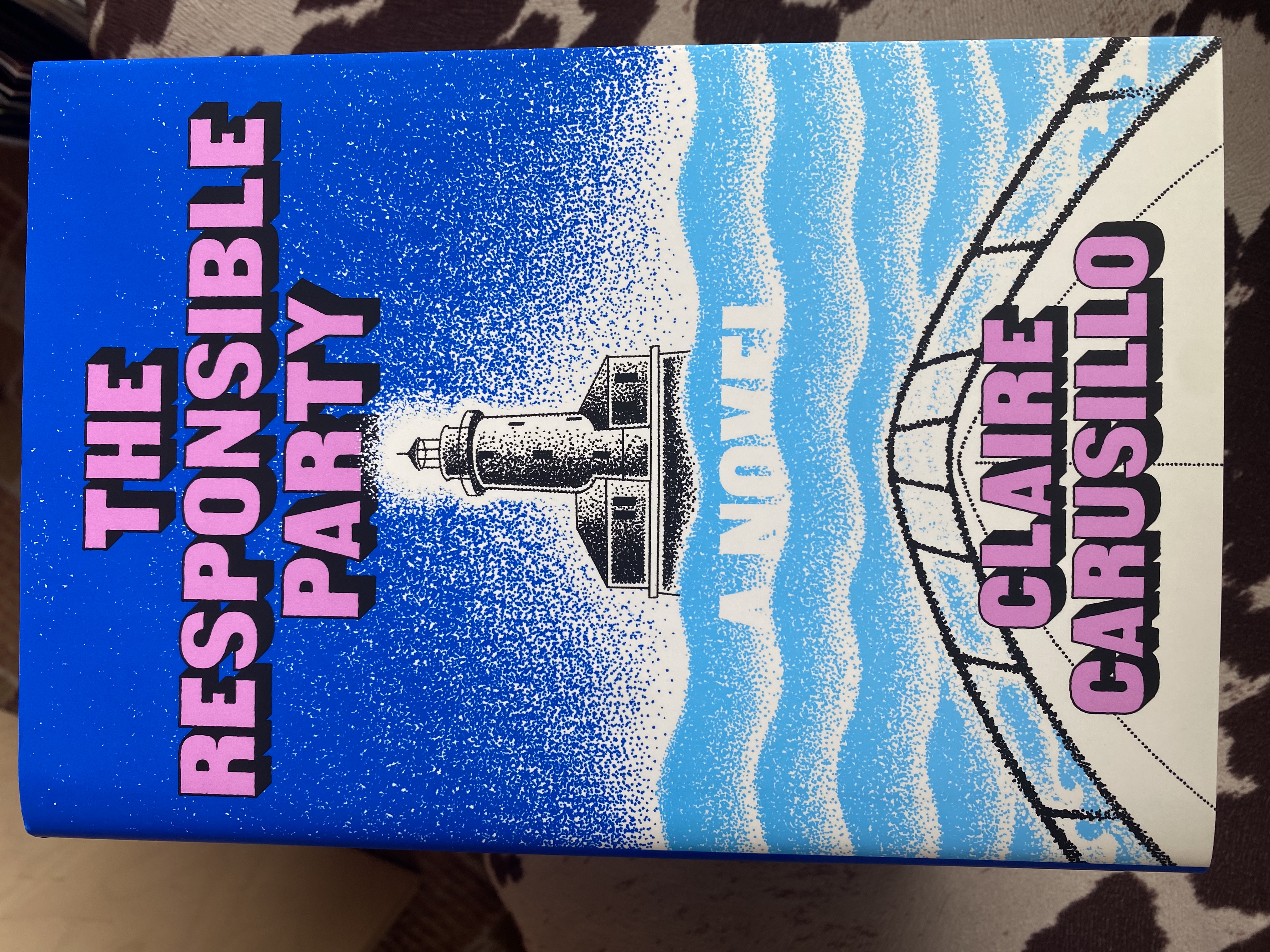 Hardcover signed first edition of Storyboard's own Claire Carusillo's debut novel, The Responsible Party!