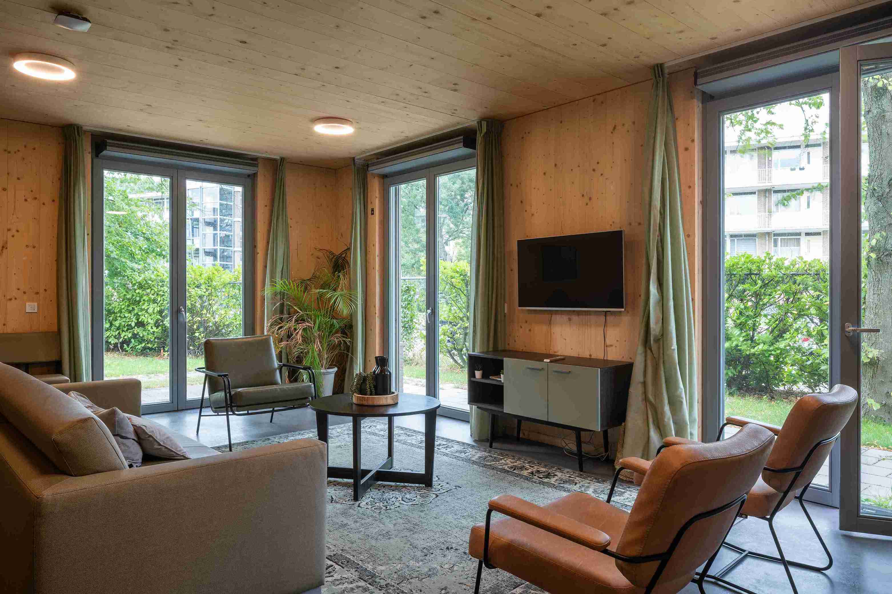 CLT-gebaseerd zorggebouw met een GPR-score van 9,0 – een duurzaam en warm toevluchtsoord aan de Grote Kreek in Rotterdam.