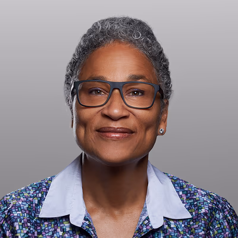 Professional headshot of Luca Oake (she/they), Strategic Business Advisor and People Leader