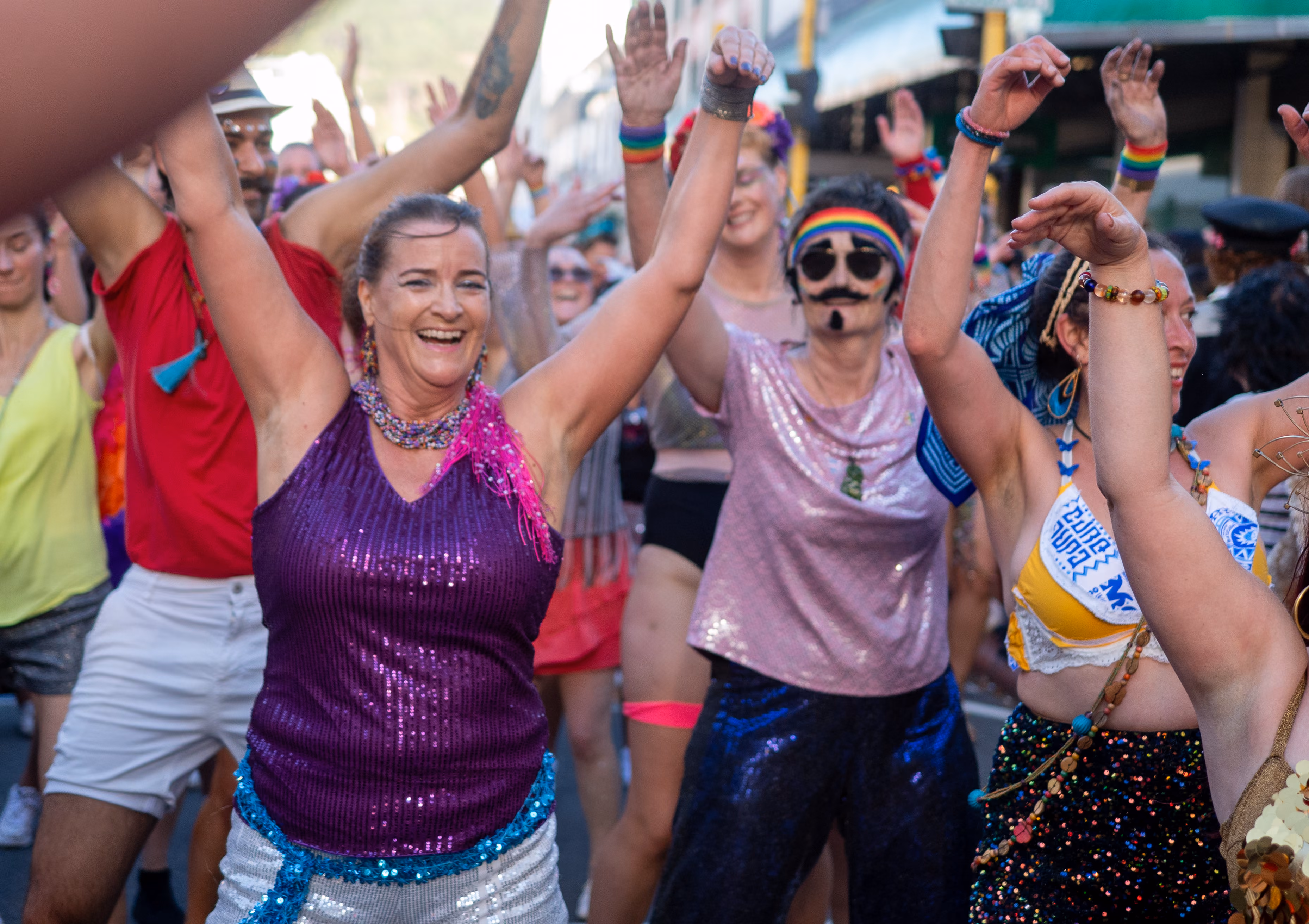 A performer in bright costume at the Wellington Pride Parade