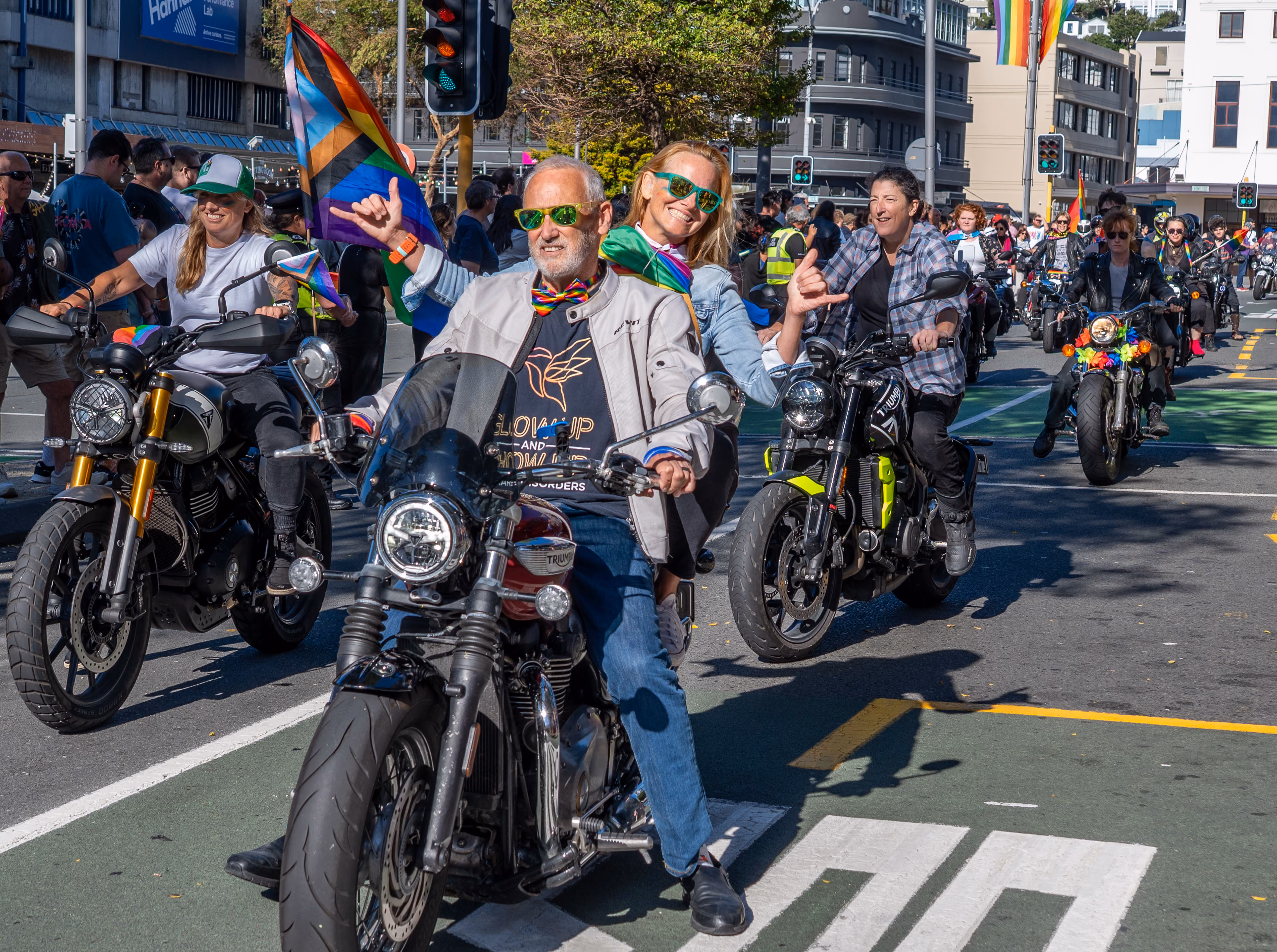 Rainbow flags held high during the Wellington Pride Parade