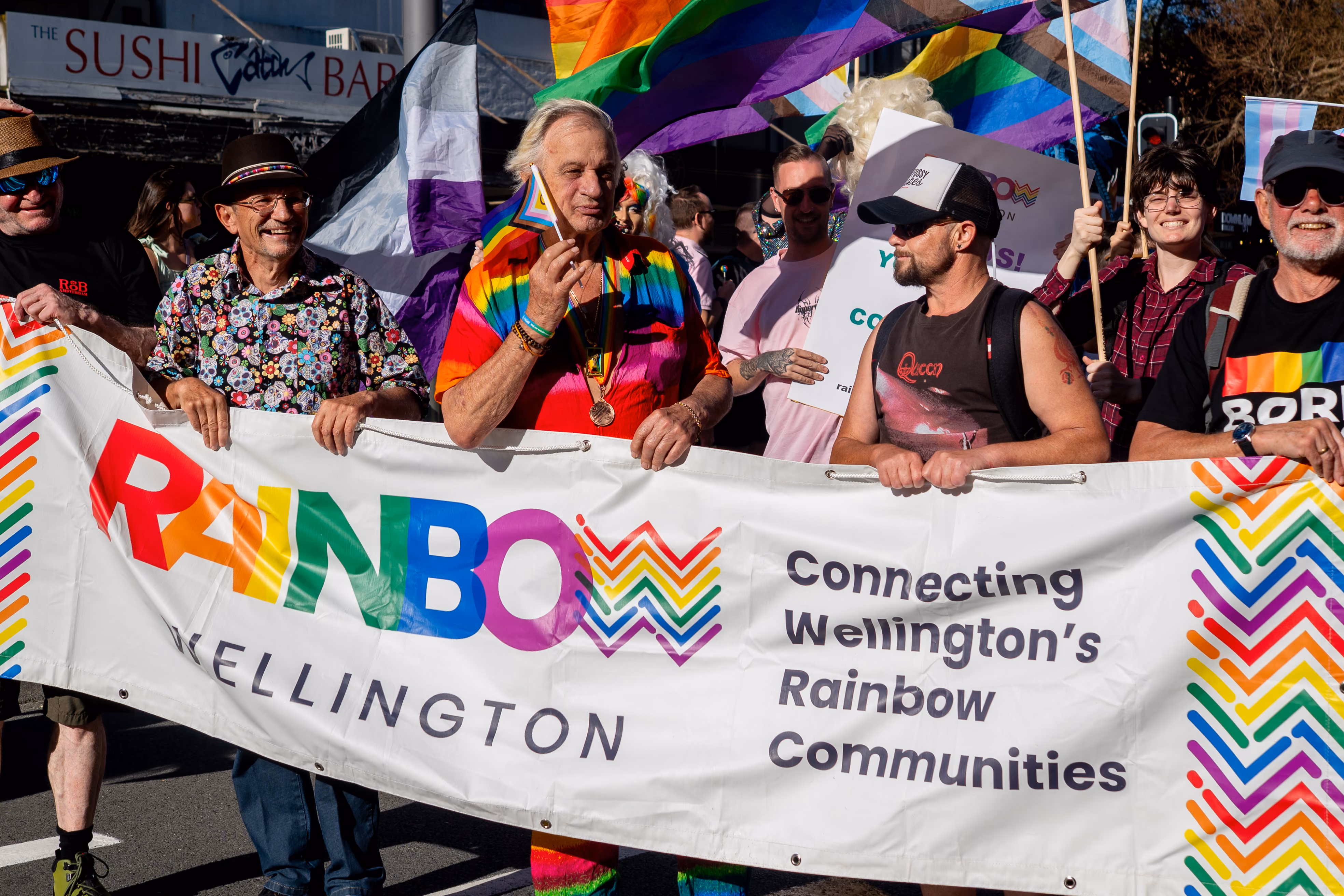 Marchers carrying banners in the Wellington Pride Parade