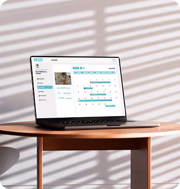 KozyGuru owner portal displayed on a laptop