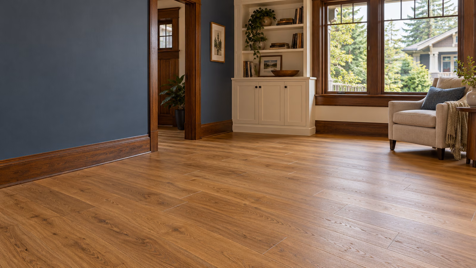 Illustrative Everett-inspired Craftsman room with warm oak-look vinyl plank flooring and retained wood trim.