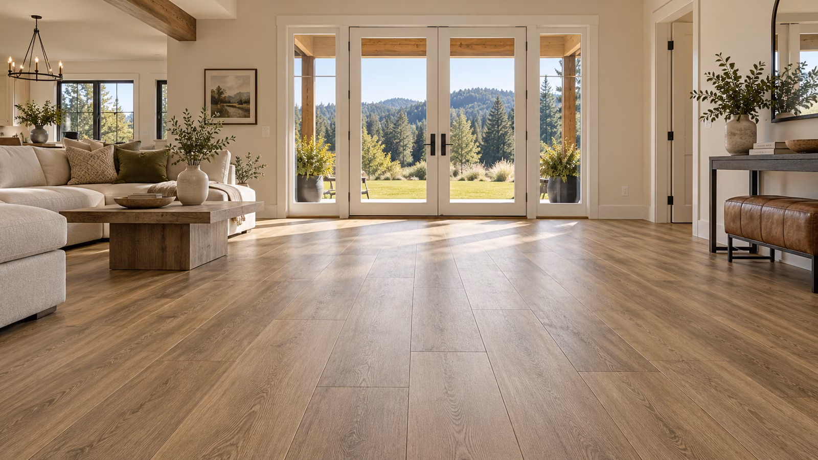 Illustrative Arlington-inspired family room with smoked oak-look vinyl plank flooring and wooded foothill views.