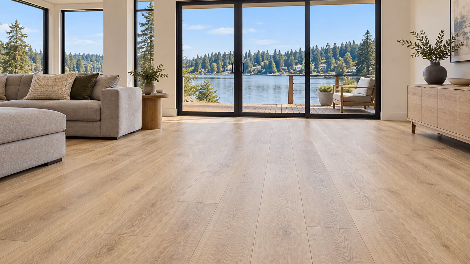 Illustrative Lake Stevens-inspired family room with blond oak-look vinyl plank flooring and a calm lakeside outlook.