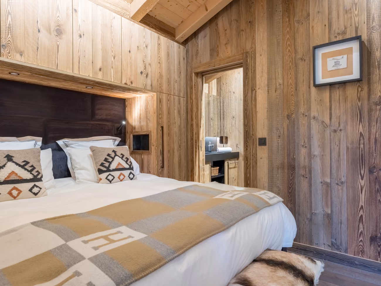 Double bedroom with en-suite bathroom in a luxury mountain chalet
