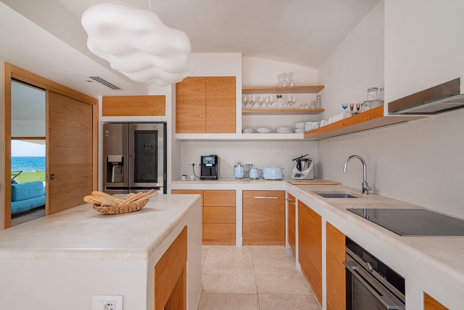 Fully equipped kitchen in a luxury beachfront villa in Sardinia.