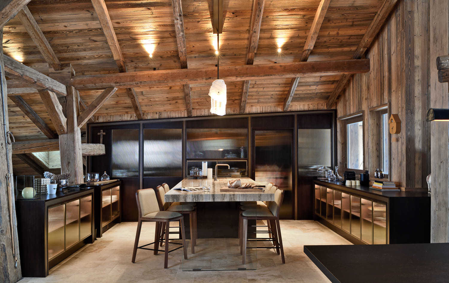 Luxury kitchen with central island in a prestigious chalet in Megève.