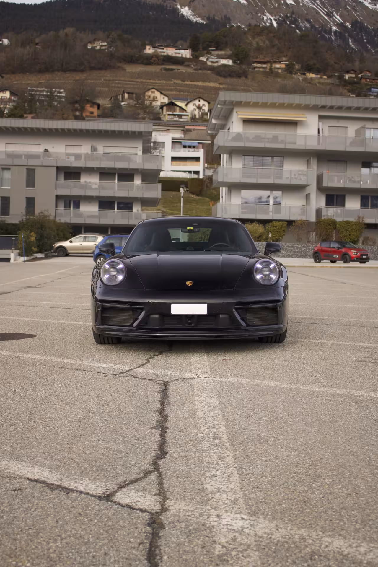 Porsche 911 GTS rental in Switzerland, high-performance sports coupe