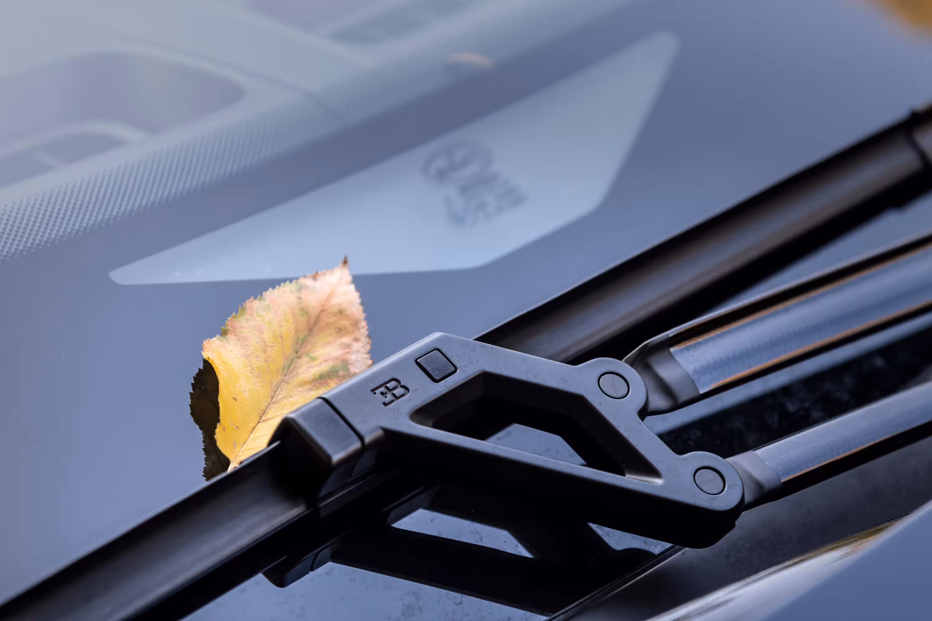 Location hypercar Genève – Bugatti Chiron rear view active wing rent