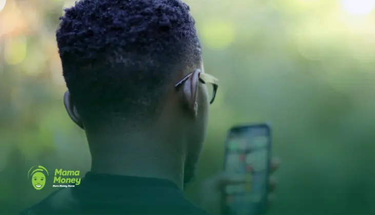 Foreign national using a smartphone to access SARS tax information in South Africa.