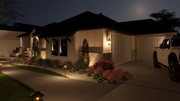 Nighttime landscape lighting plan featuring illuminated planting beds and pathway lighting around a custom Texas Hill Country home.