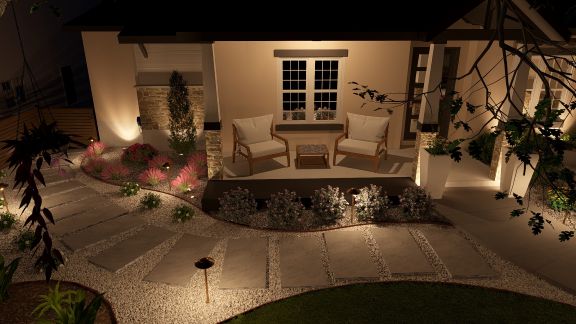 Luxury front porch landscape concept featuring decorative walkways, planting beds, and outdoor lighting for a San Antonio residence.
