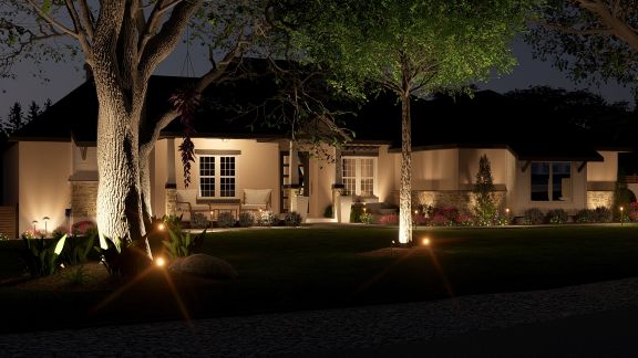 Luxury front yard lighting plan featuring tree uplighting, pathway lights, and architectural illumination for a San Antonio home.