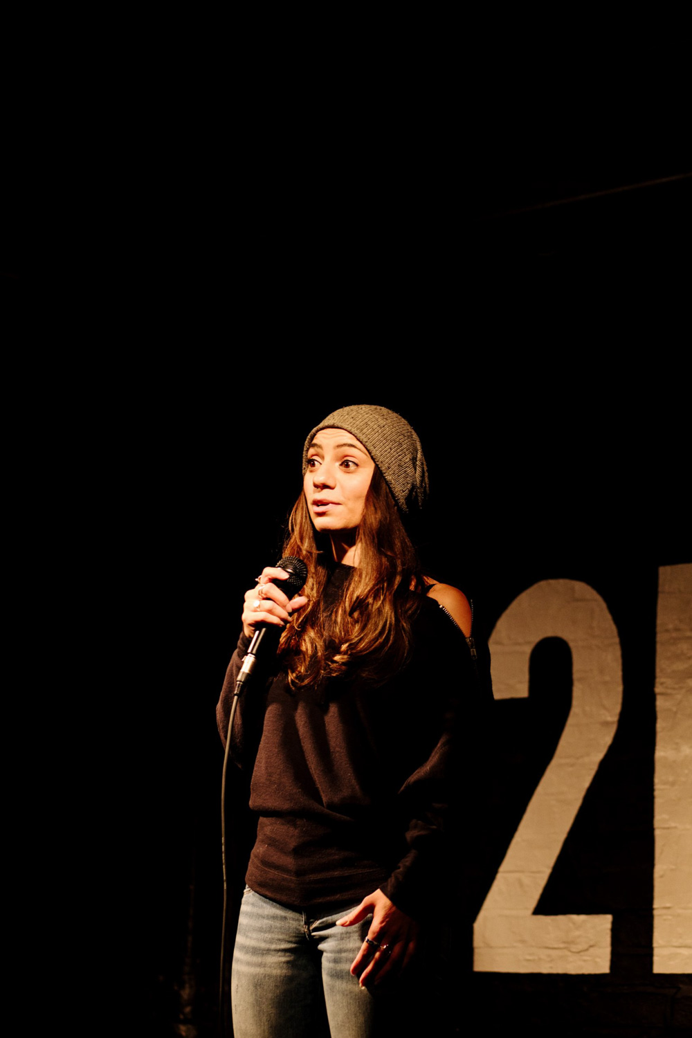 Comedian Liz Miele performing stand-up