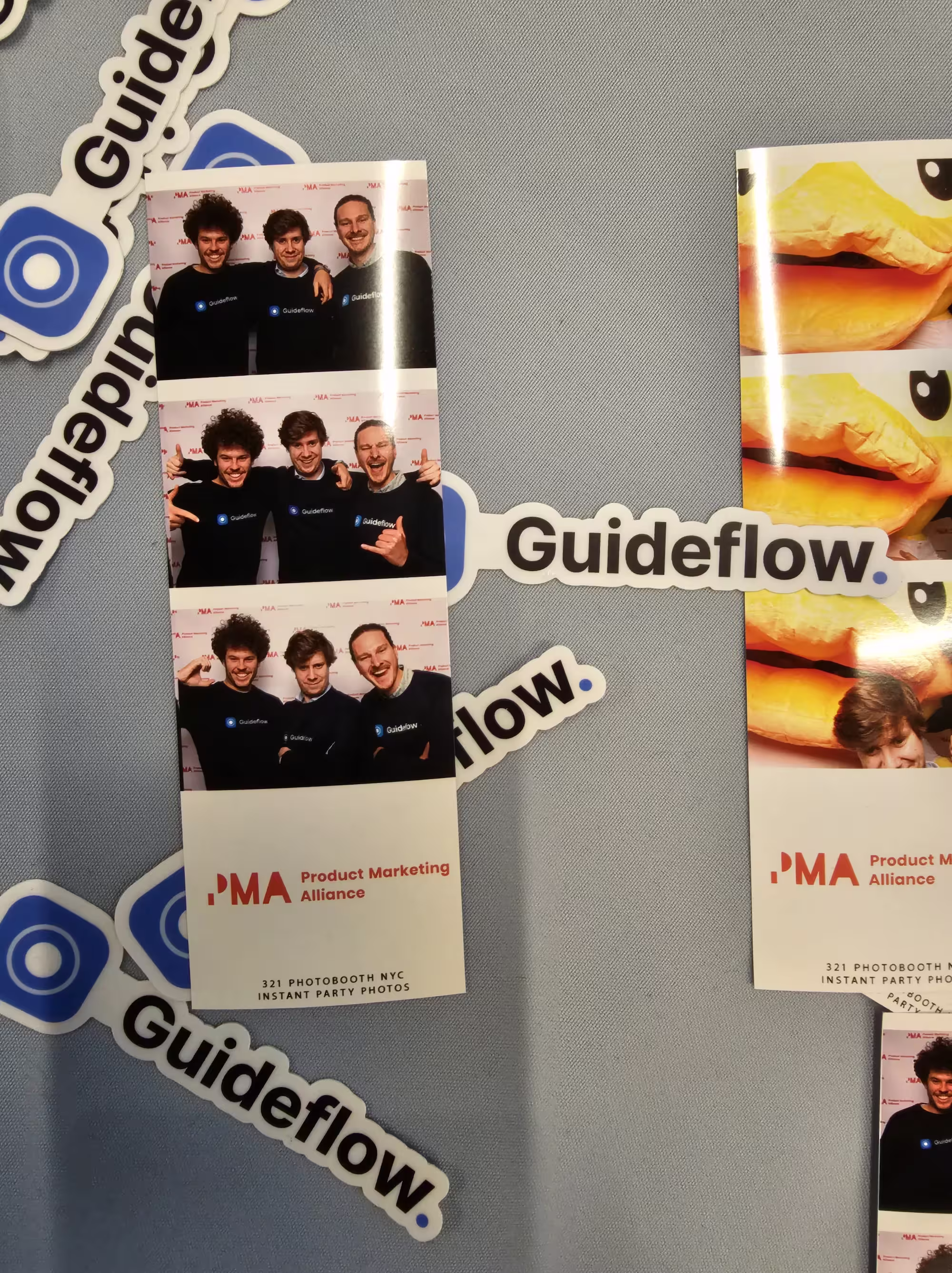 Photobooth strip with three men wearing black Guideflow shirts posing in different fun poses at Product Marketing Alliance event.