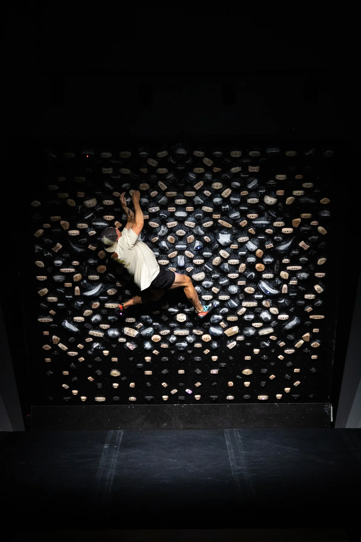 Climber working on Tension Board 2 at Shift Climbing gym