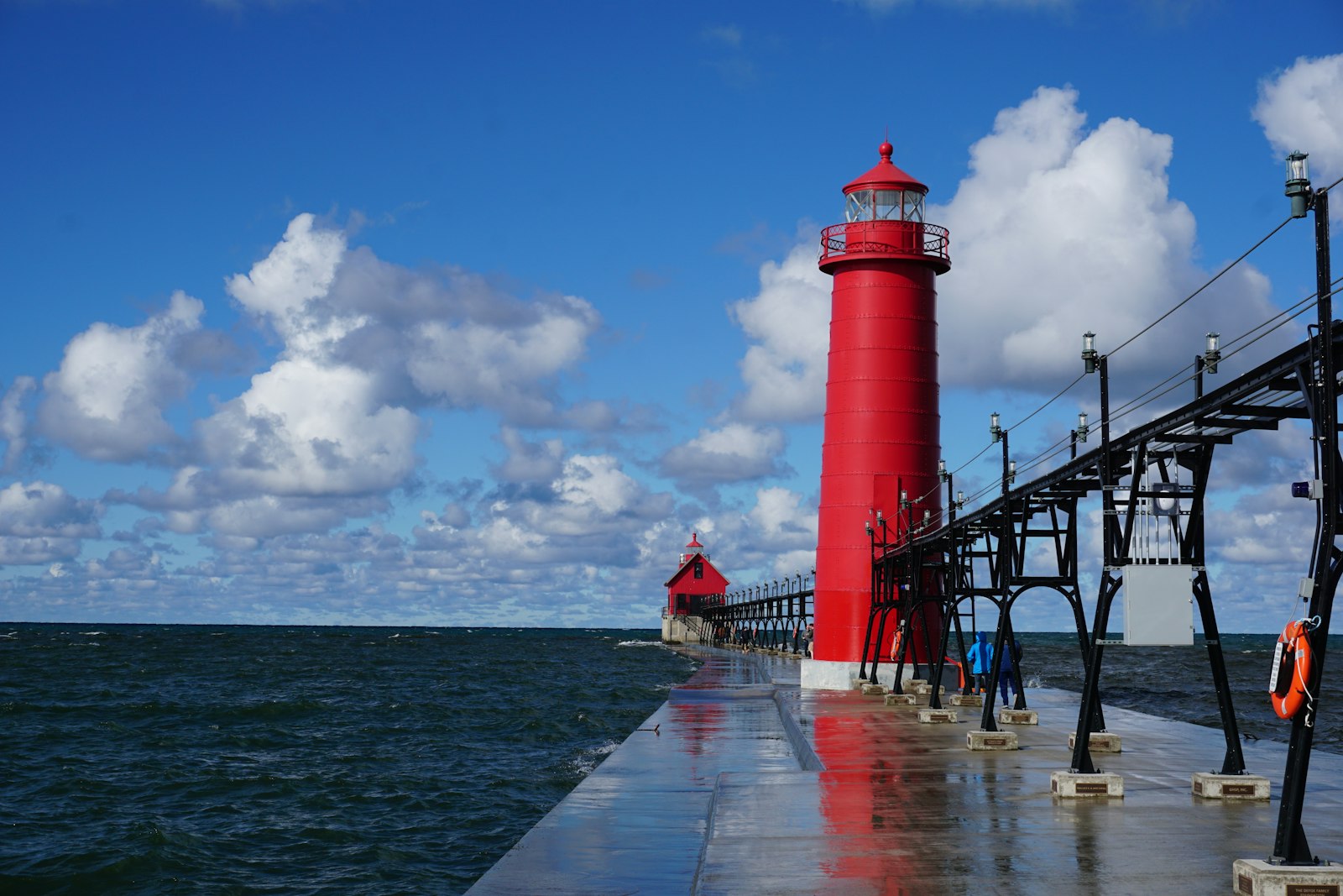 Red and white lighthouse on the Lake Michigan shore near Grand Haven