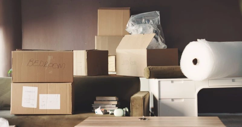 low-use items to pack first when moving