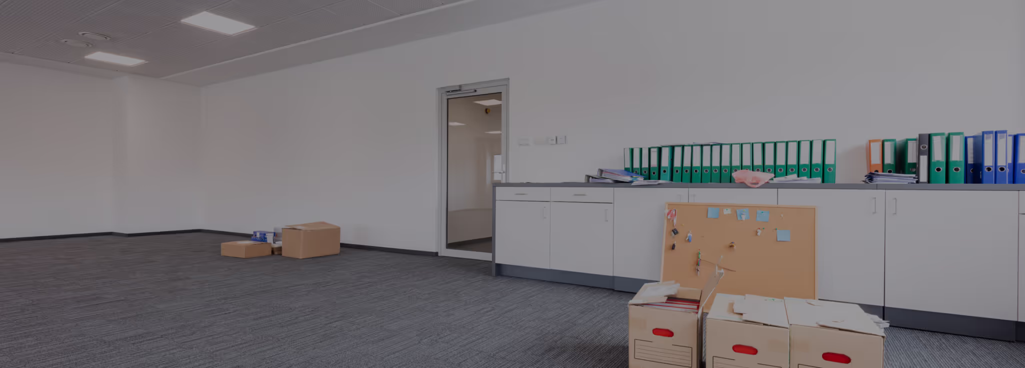 BoxStar commercial moving team safely transporting office equipment and modular desks in Ashburn VA