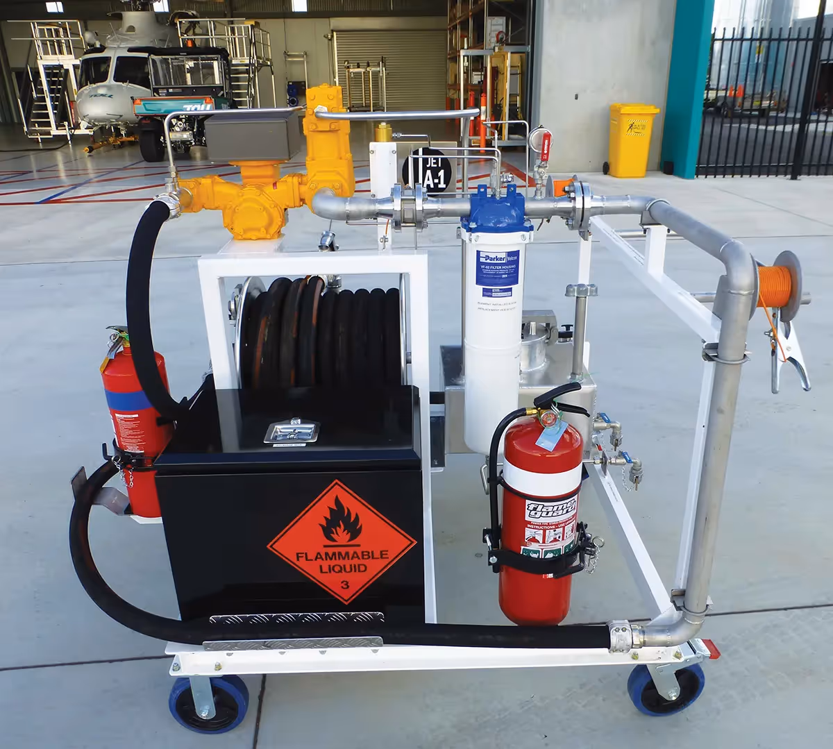 This hydrant cart connects to drybreak fittings located in special pits along the subterranean stainless pipeline to access fuel.