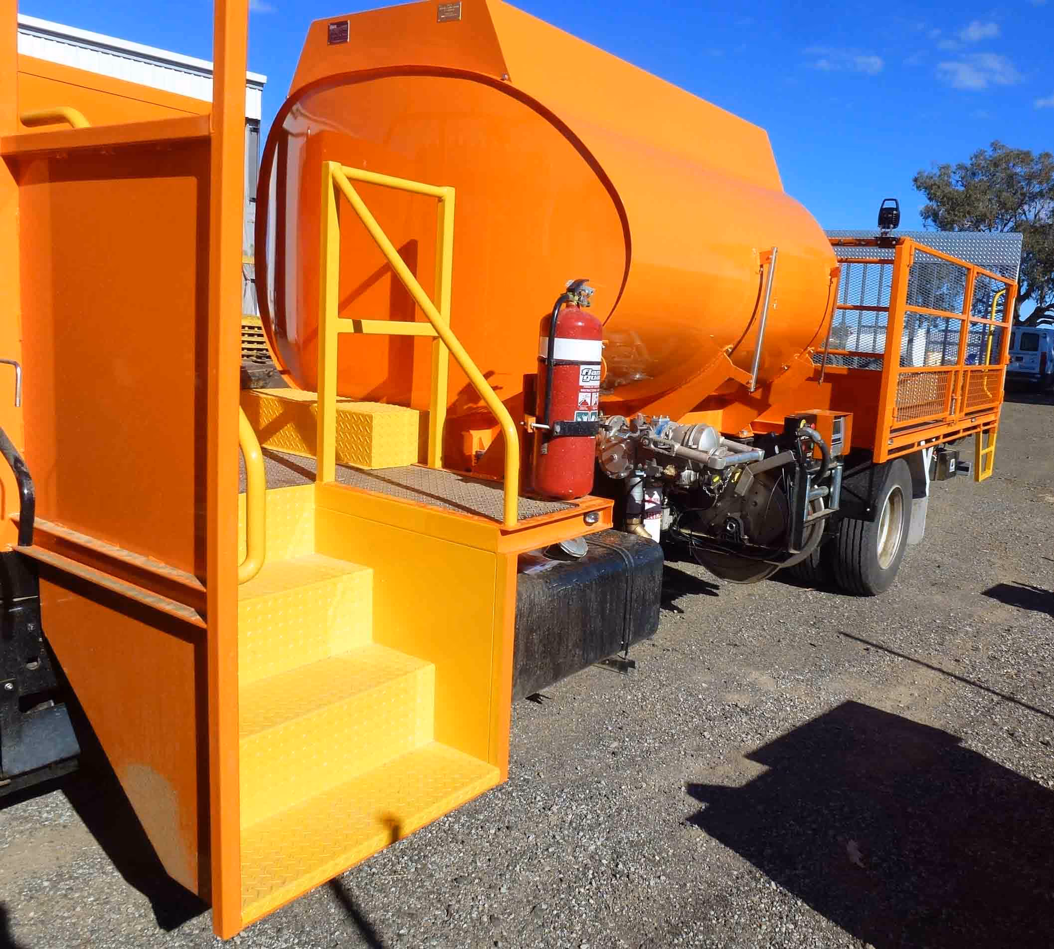 Shows safe access steps to front deck and front tool storage cabinets