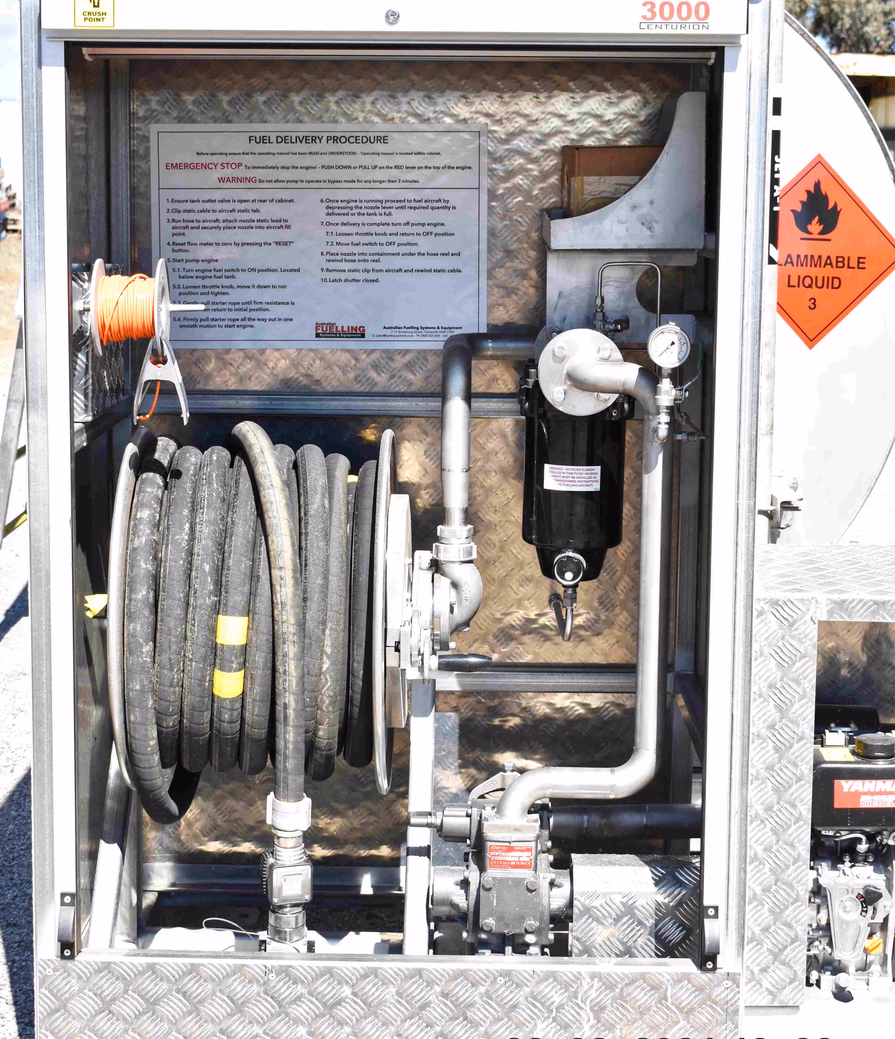 The dispensing system showing hose reel, filter, pump. The Haar hose reel has easily operated geared manual rewind. The dispensing equipment cabinet is secured by a lockable roller door.