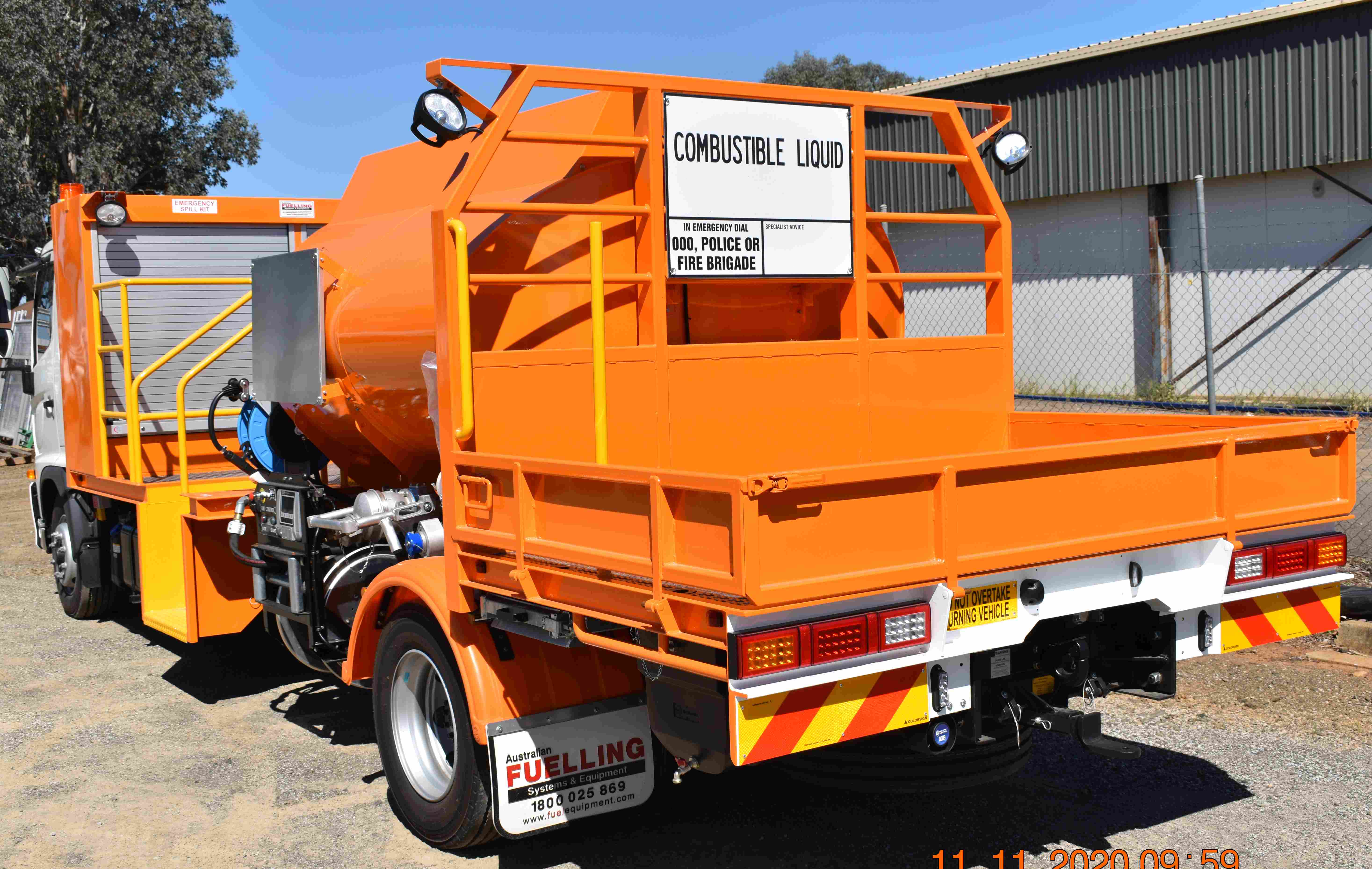 Rear view of one of the tankers showing load deck, work lights & roller door access to storage cabinets at front