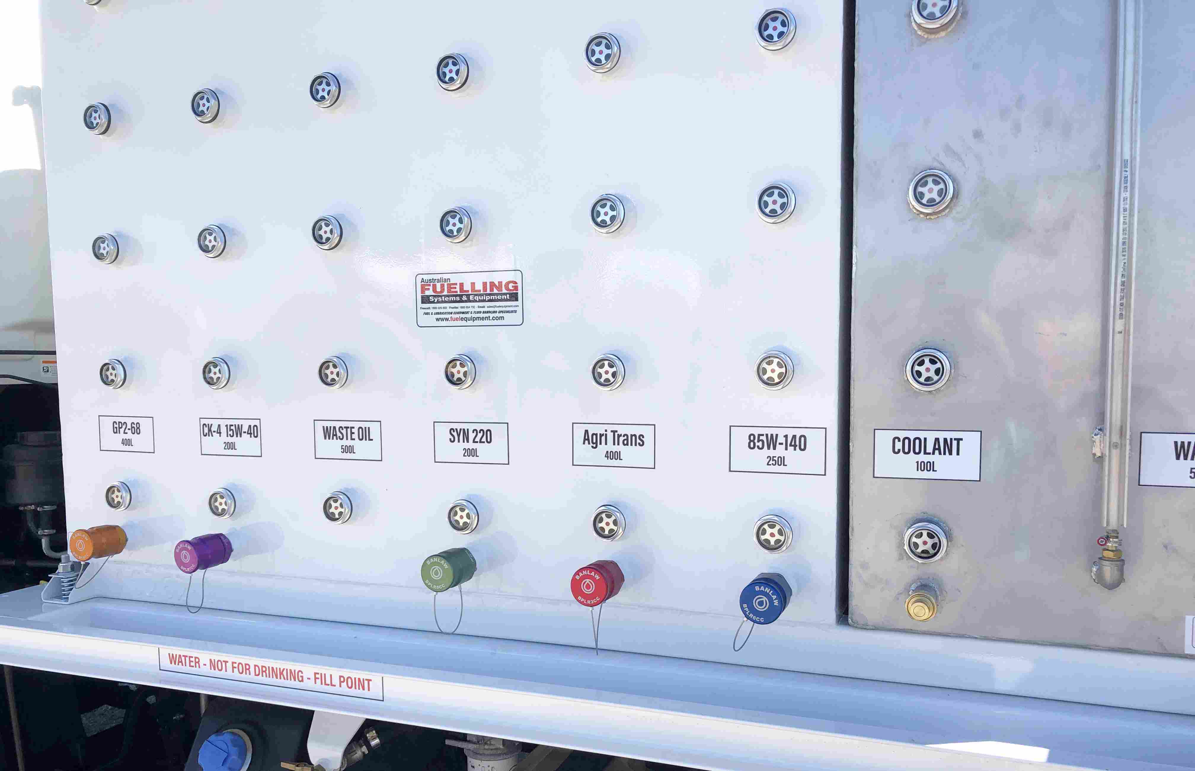 Fluid tanks with level sight windows. All products have selective coloured fill connections.