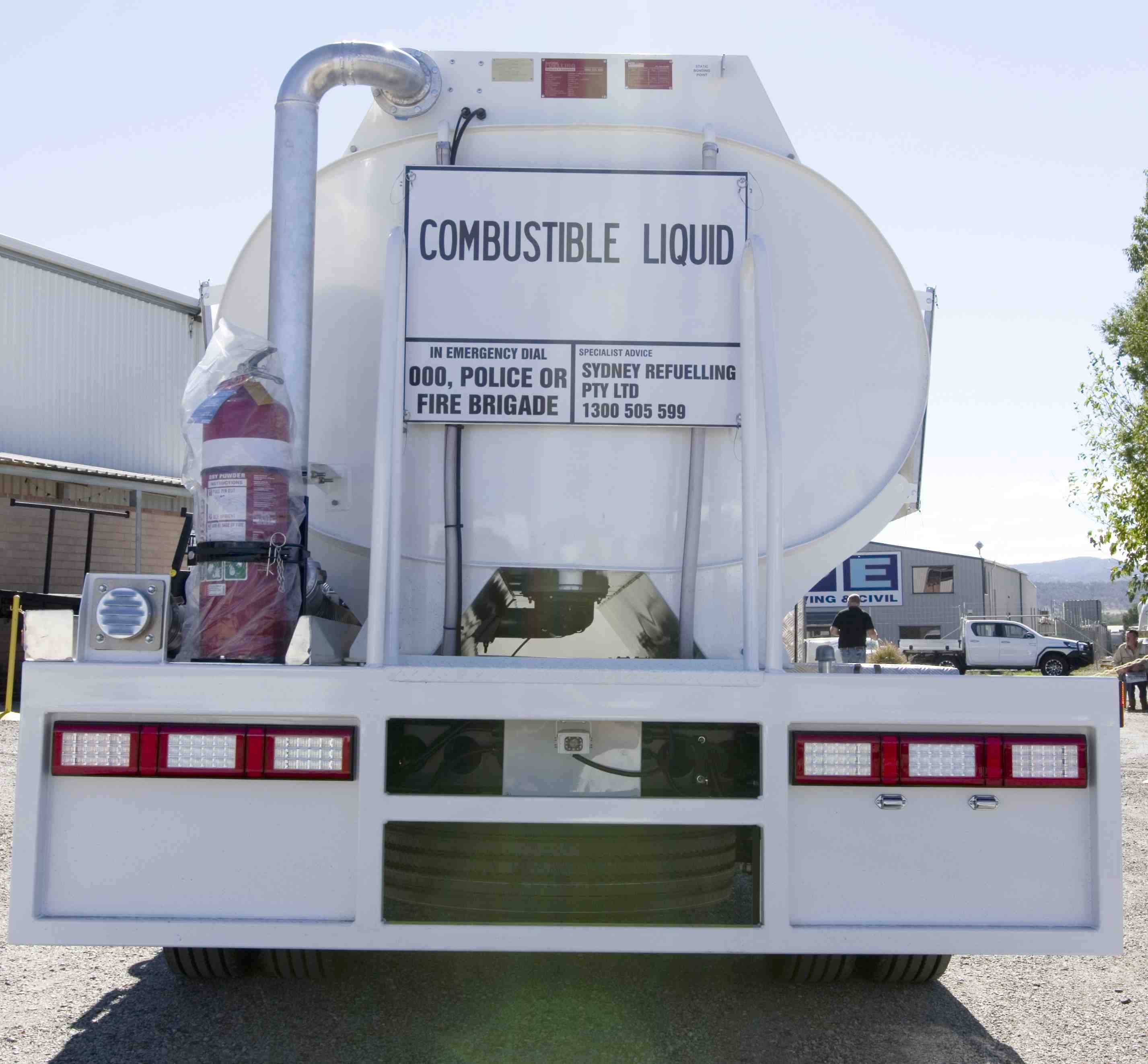 Rear of tanker showing access ladder and vapour recovery piping.