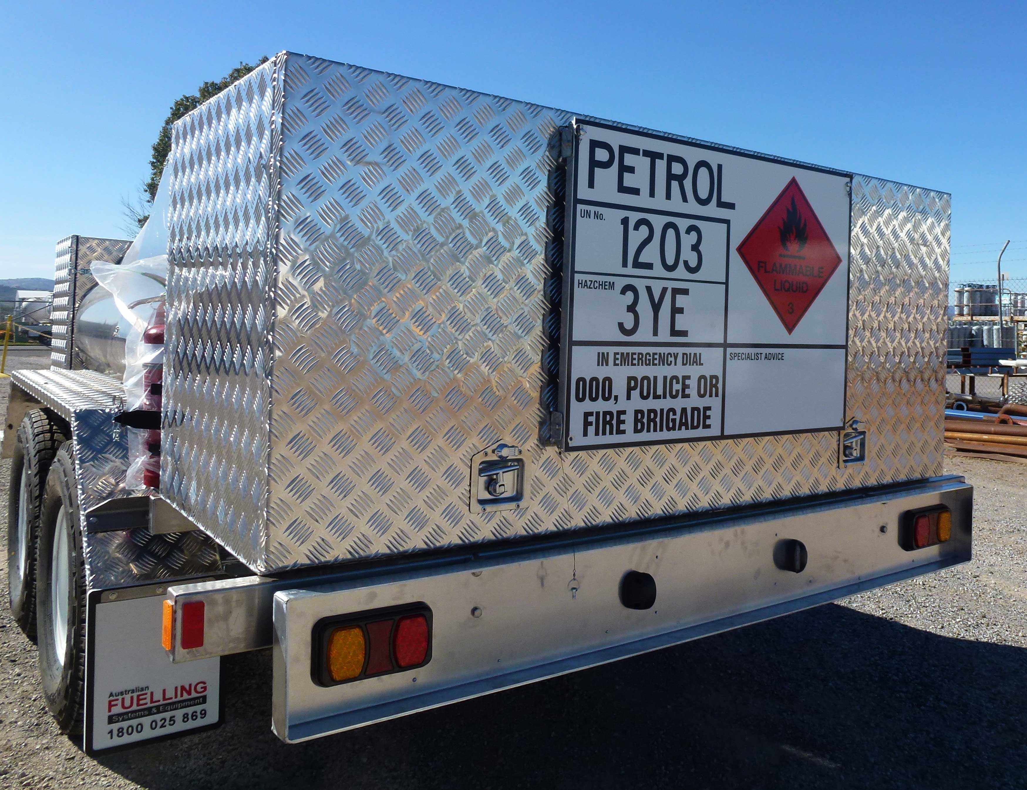Rear view of the trailer showing stainless bumper and checker plate aluminium cabinet