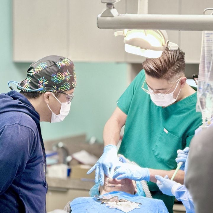 Dr. Noh (Oral Surgeon) and Dr. Tanaka (Prosthodontist) working on a full mouth rehab.