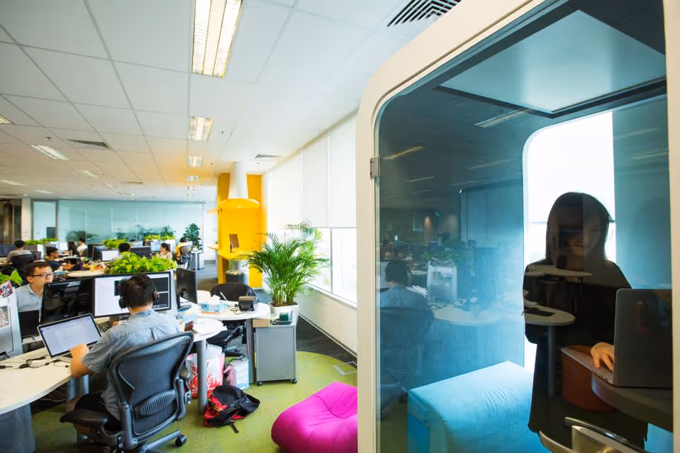 Employees work at the Garena Interactive Holding Ltd. headquarters in Singapore, on Thursday, Aug.... [+] 25, 2016. Garena, a gaming and e-commerce empire that is now Southeast Asia's largest startup, is a Singapore-based company that's valued at more than $3.75 billion. (Nicky Loh/Bloomberg)