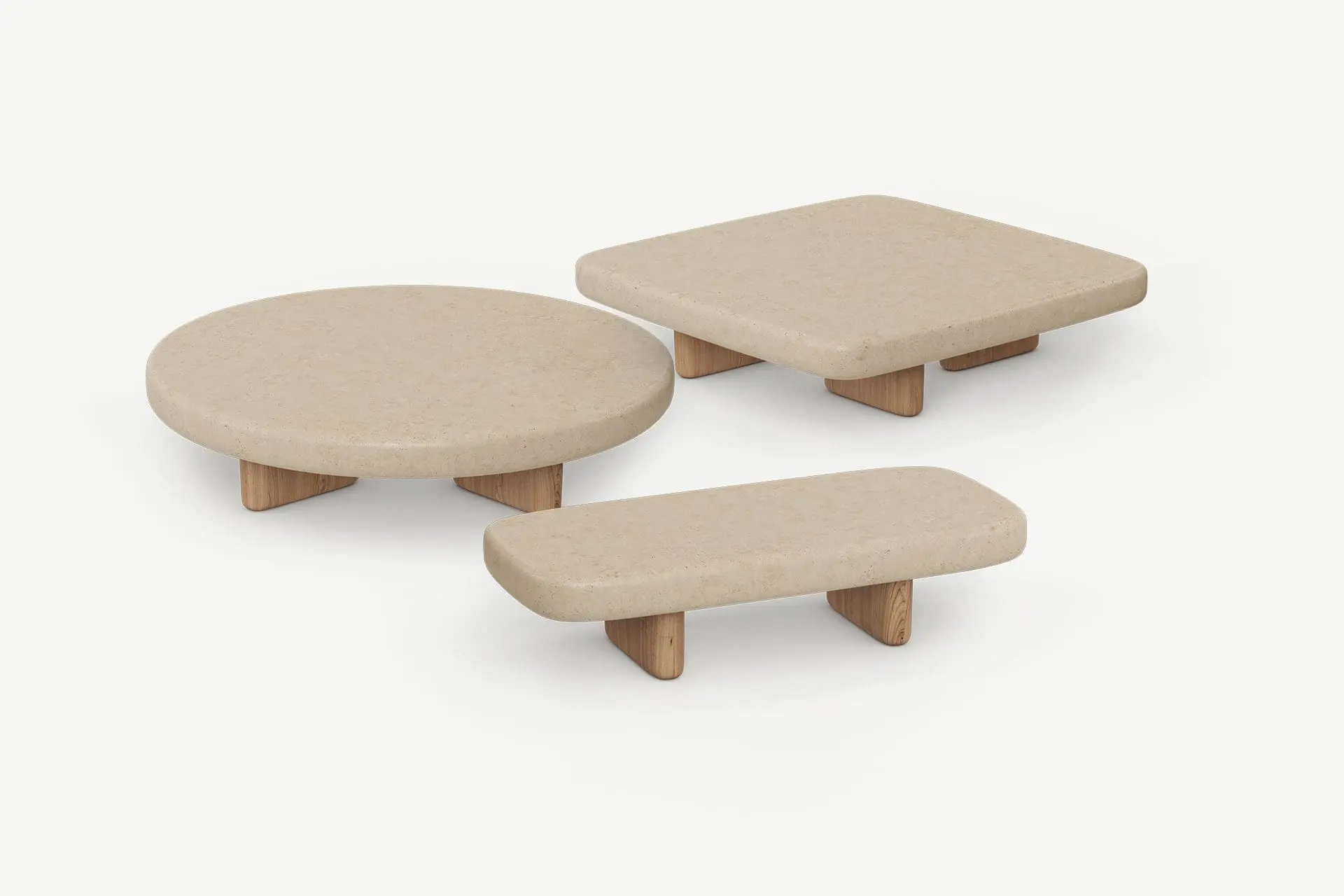 Drei beige Steinplatten in runder, rechteckiger und länglicher Form auf kurzen hölzernen Füßen.