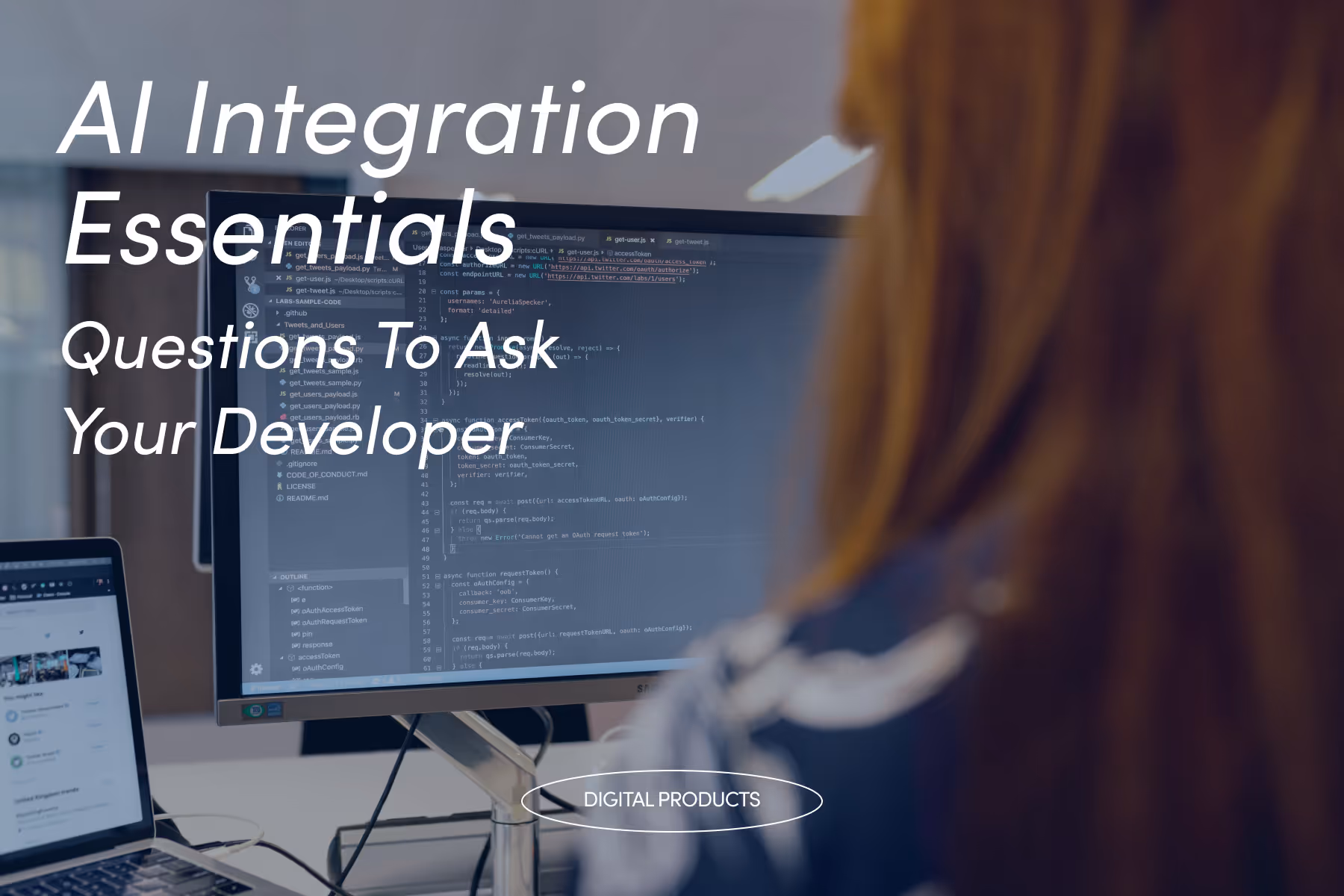 Developer viewing code on large monitor, with text overlay 'AI Integration Essentials: Questions To Ask Your Developer'. Laptop visible