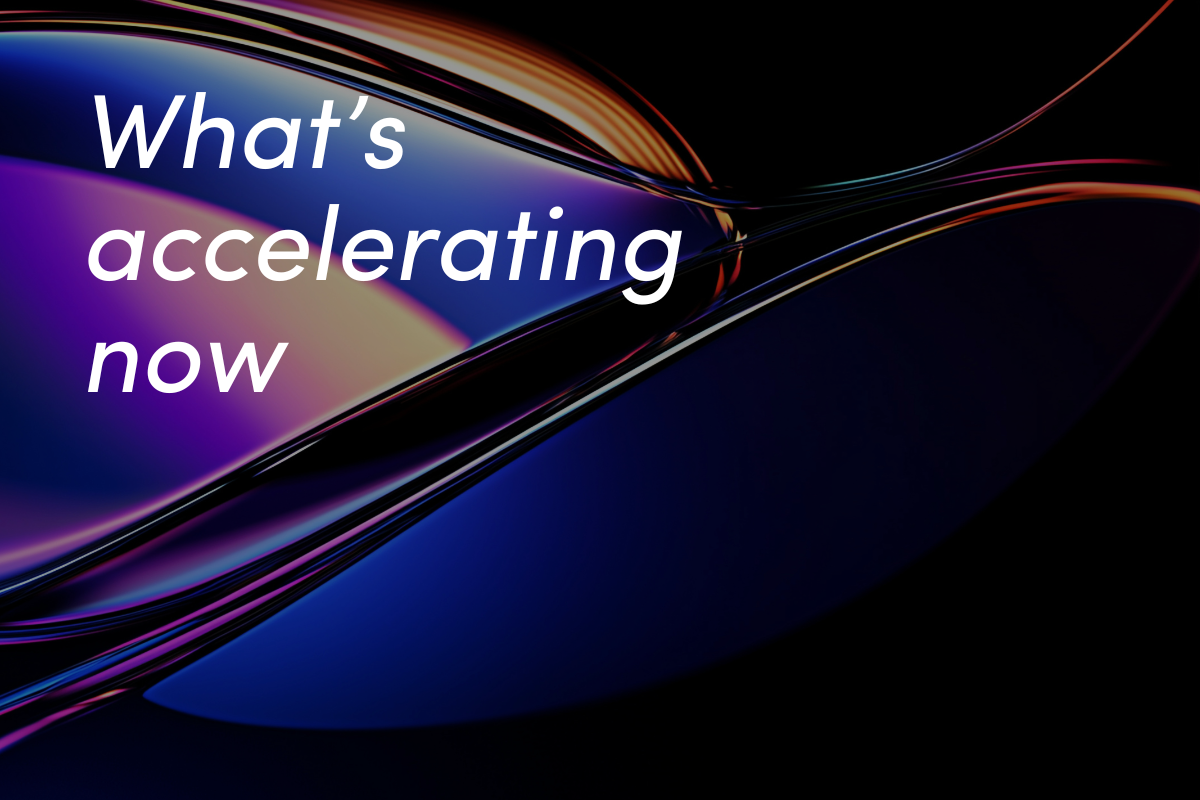 Dynamic flowing ribbons in purple, blue, and orange creating smooth curved motion against dark background.