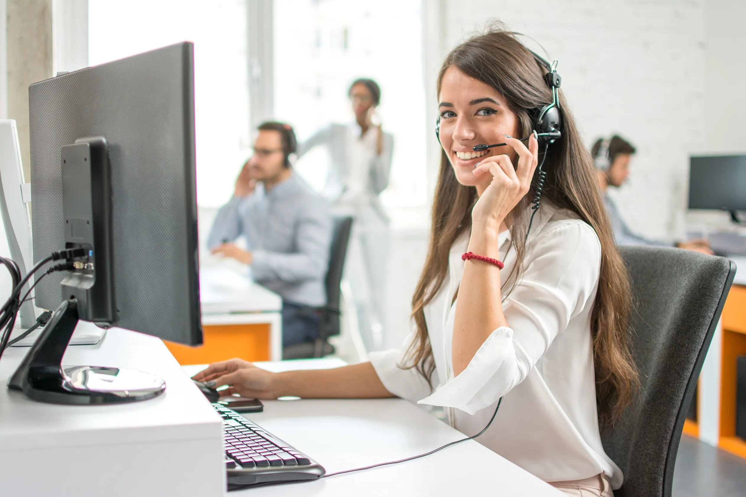 woman on call - How to Scale Customer Support