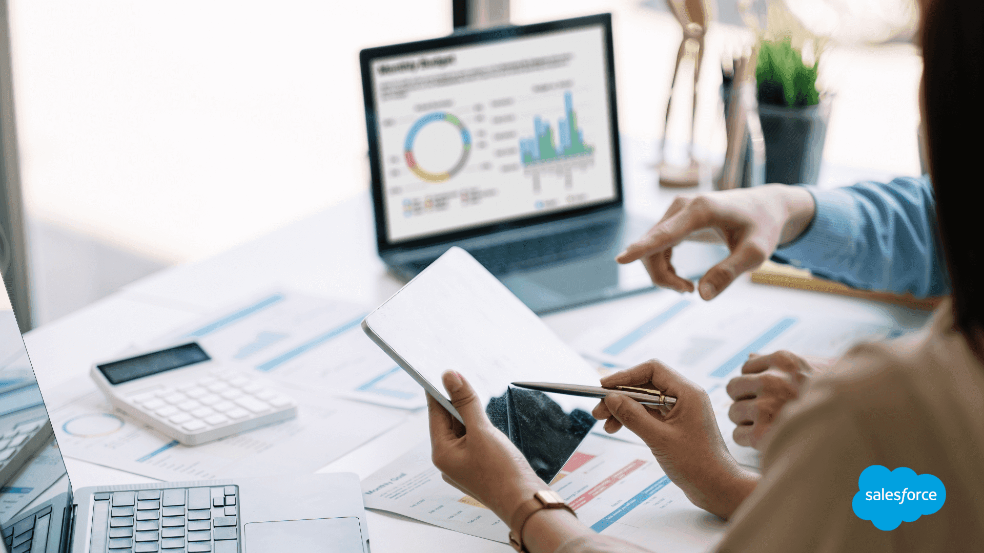 Colleagues reviewing business metrics - Automated Lead Qualification