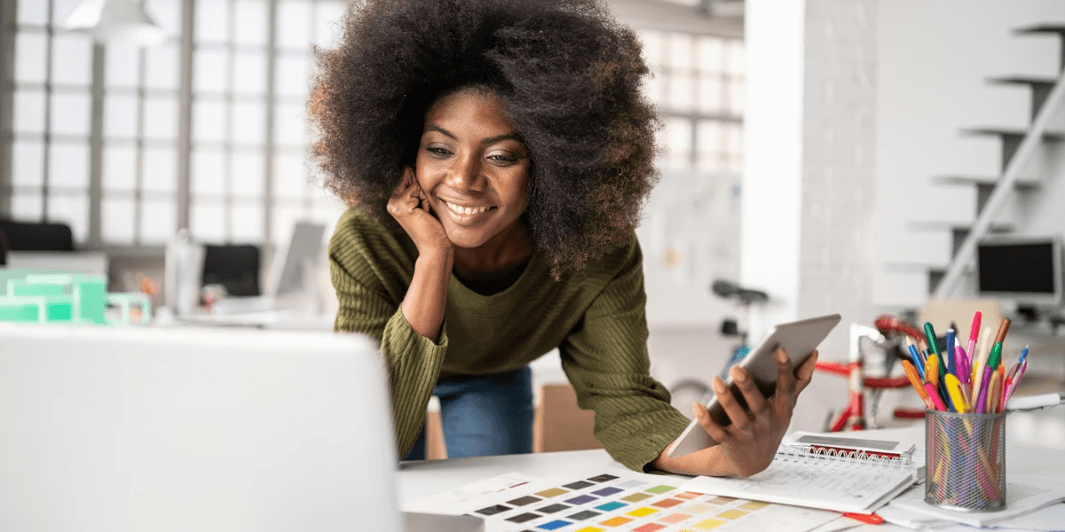 Woman multitasking with tech tools - How to Grow a Brand