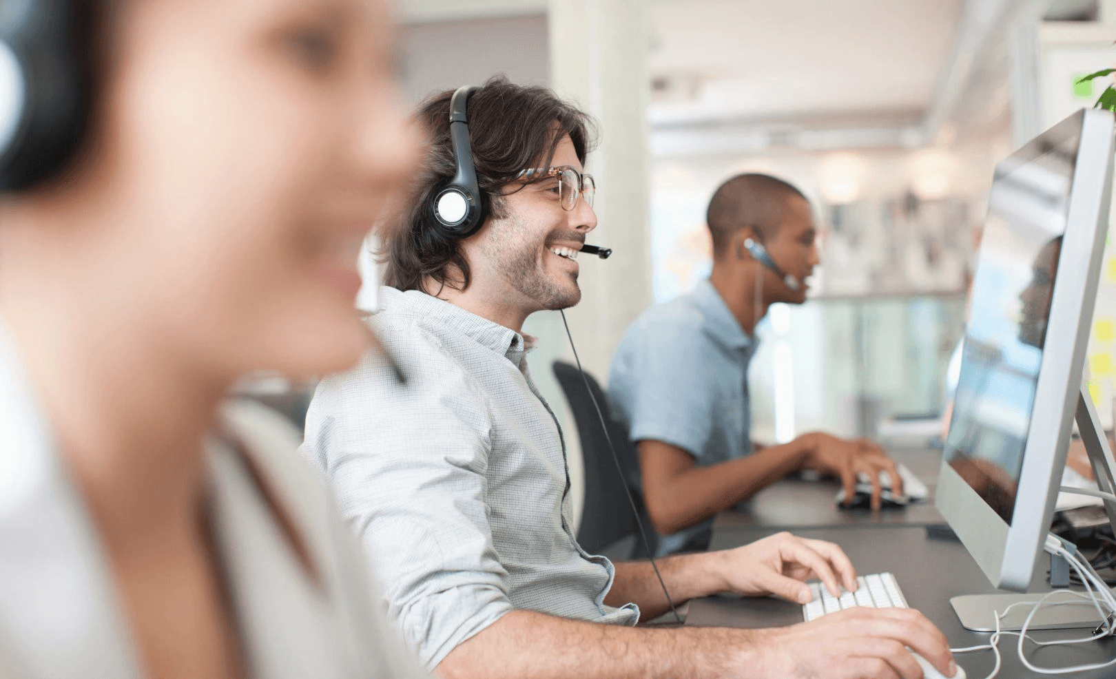 Customer support team working in office - Best IVR Experience
