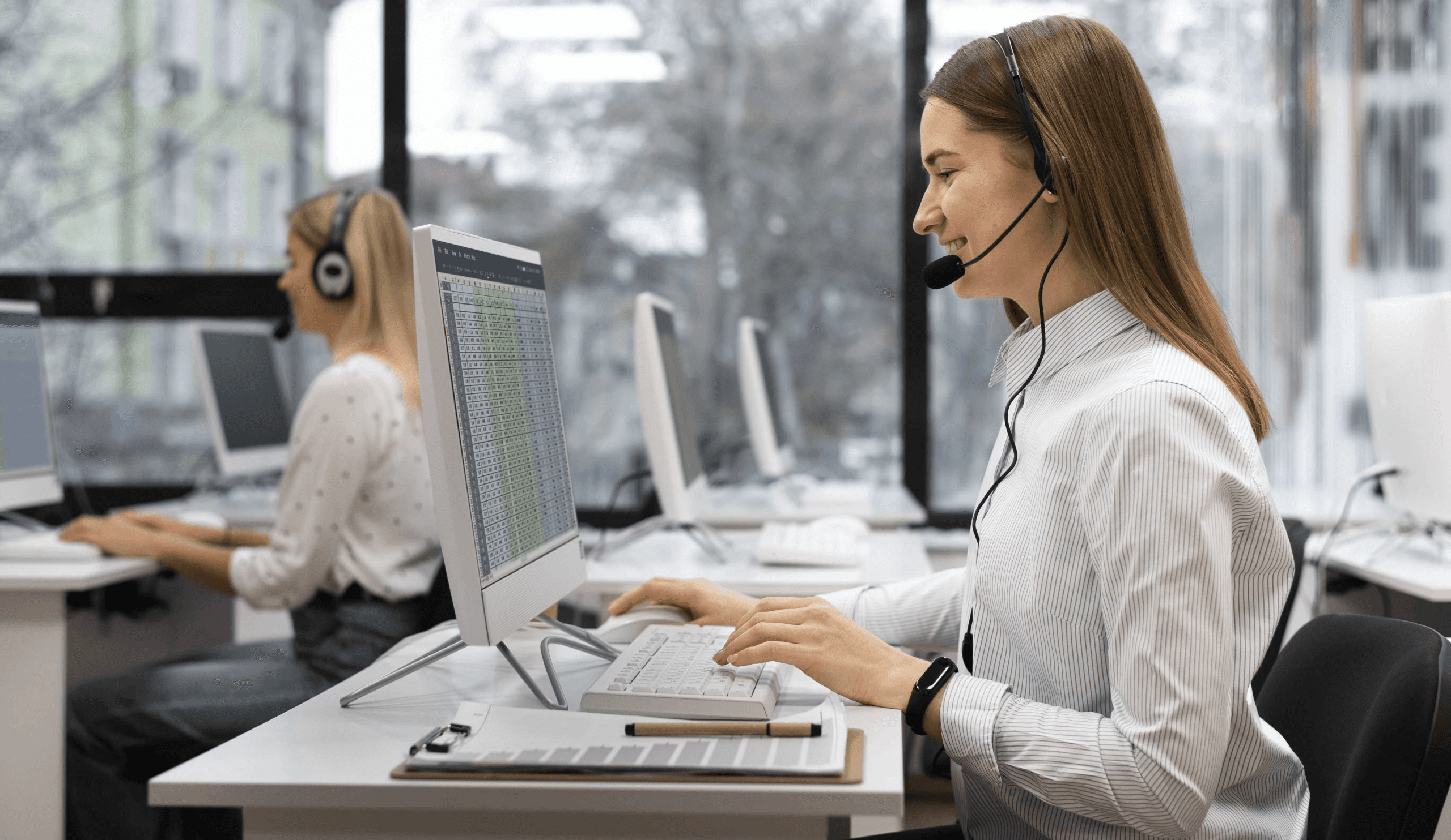  Agents providing customer phone support - How to Improve CSAT Scores in a Call Center