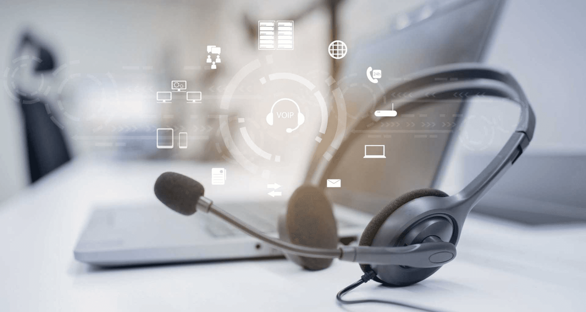 Headset with technology icons - What Is a Warm Transfer in a Call Center