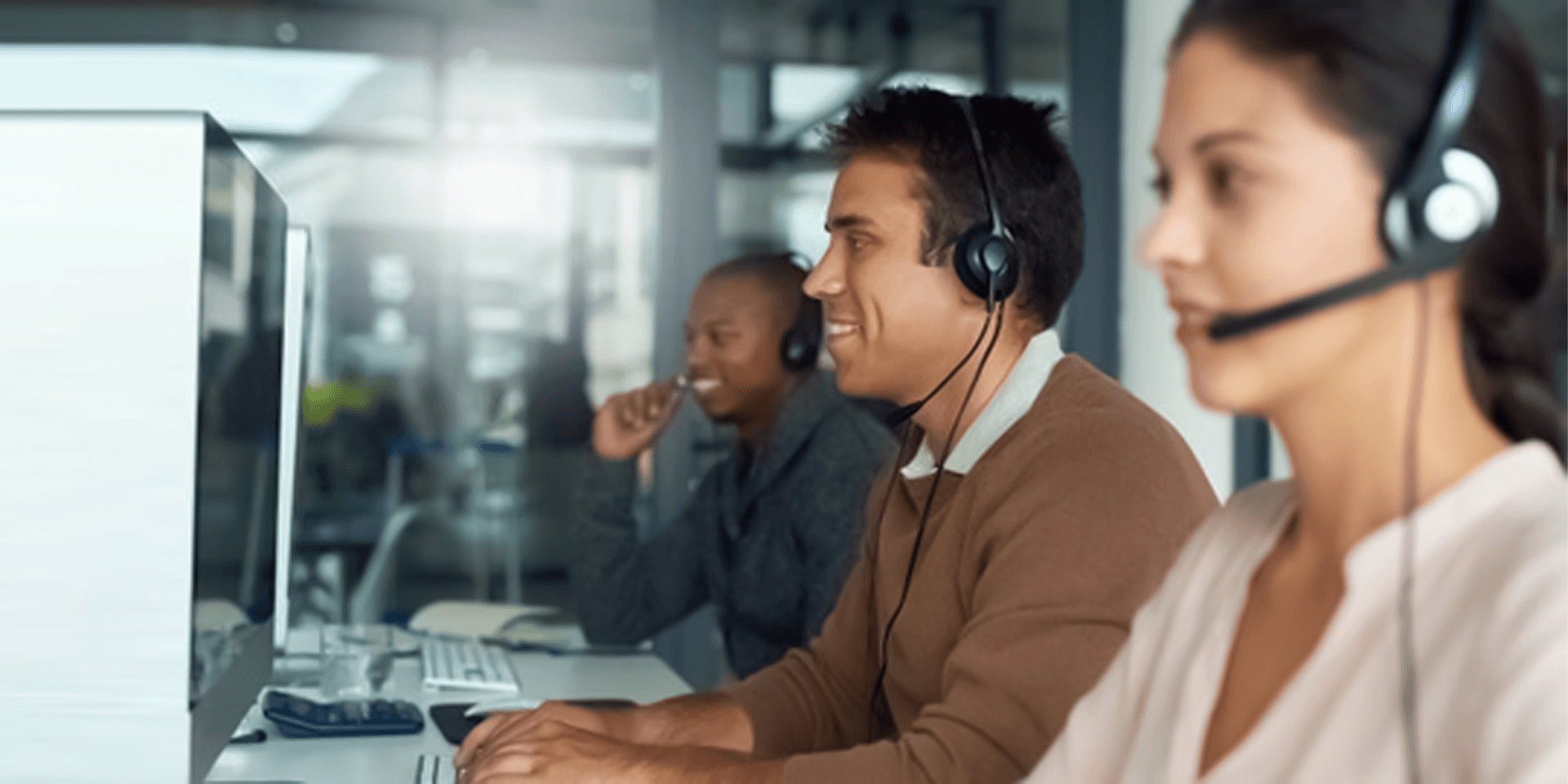 Customer service team working in office - Call Center Optimization