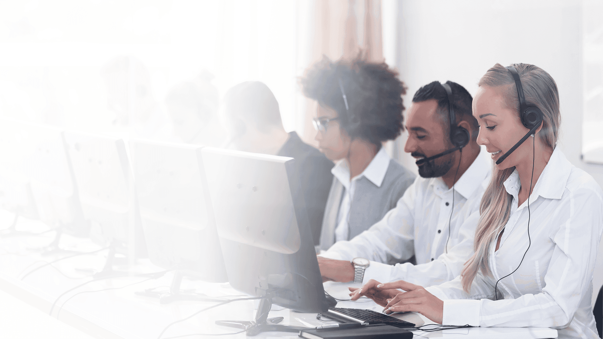 Customer service team working in office - Inbound Call Routing